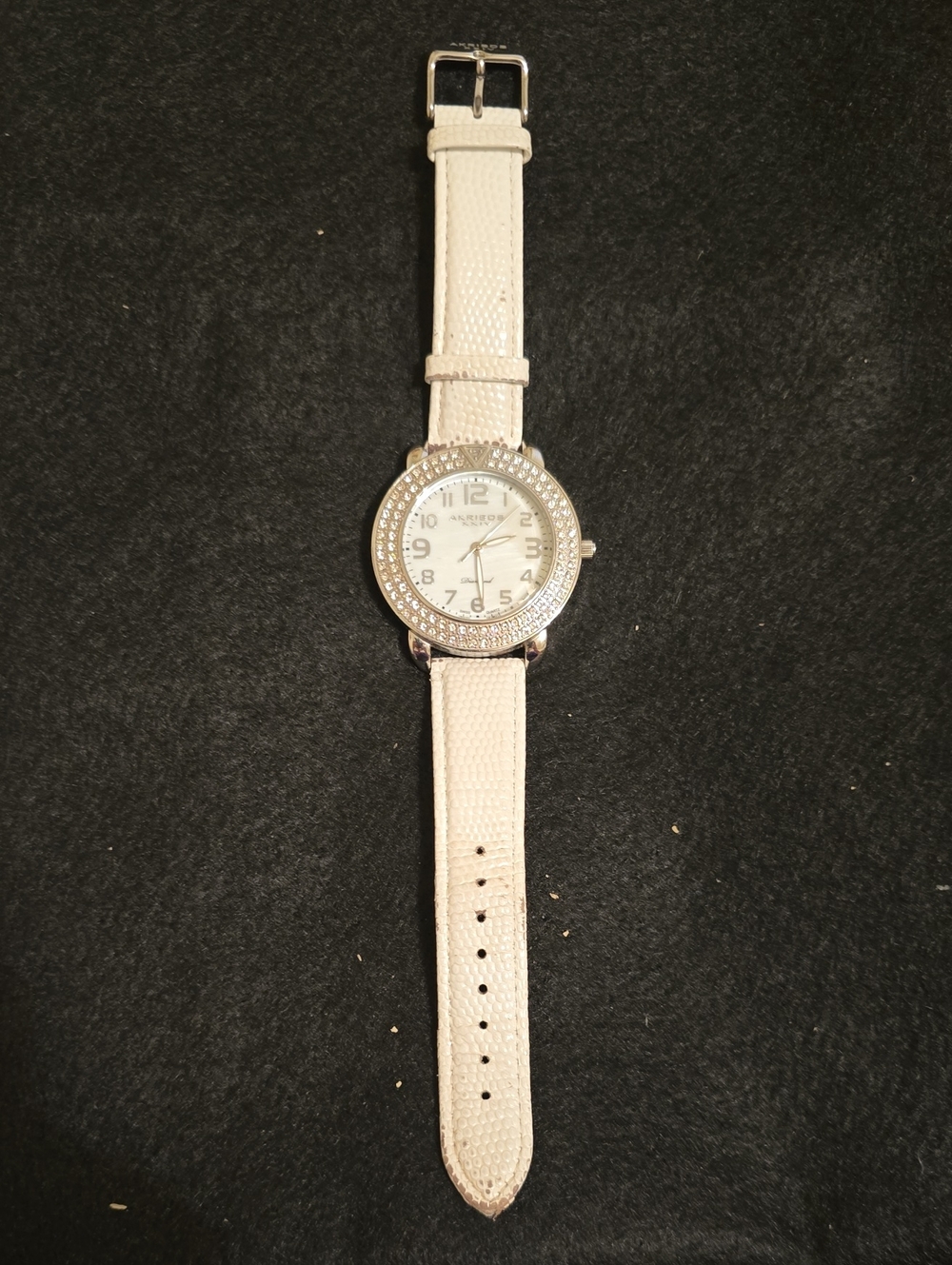 Akribos XXIV Watch with White Leather Band.